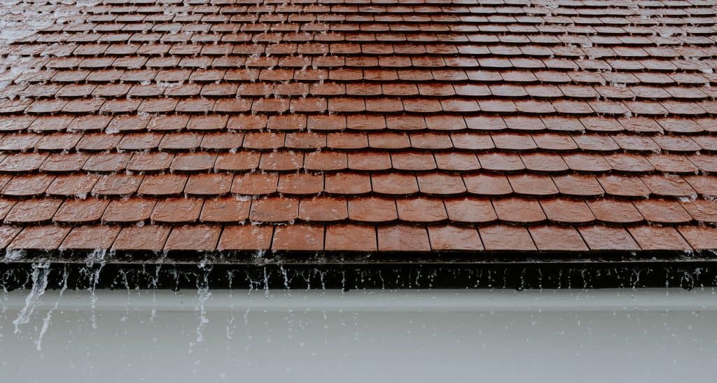 Image of water running off of a roof